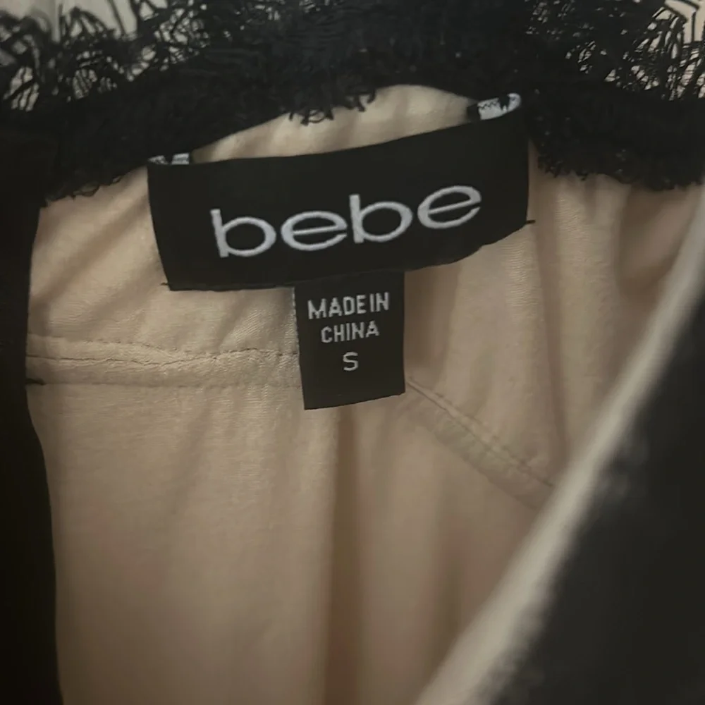 Bebe size small Lacey black tight dress. Zipper works. Never been worn! - Picture 5 of 5